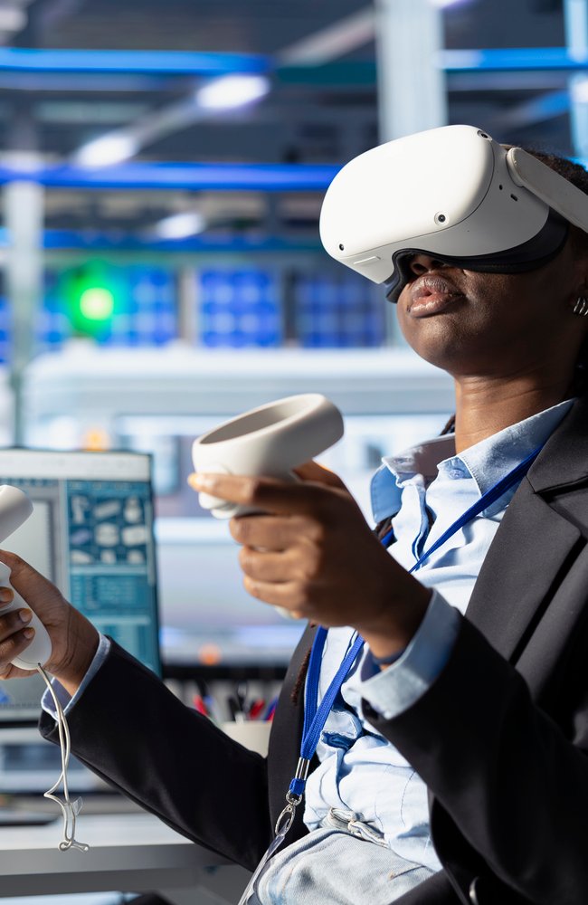 Engineer in photovoltaics factory using virtual reality equipment to diagnose malfunctioning systems. African american solar panels plant worker using VR headset to reduce downtime